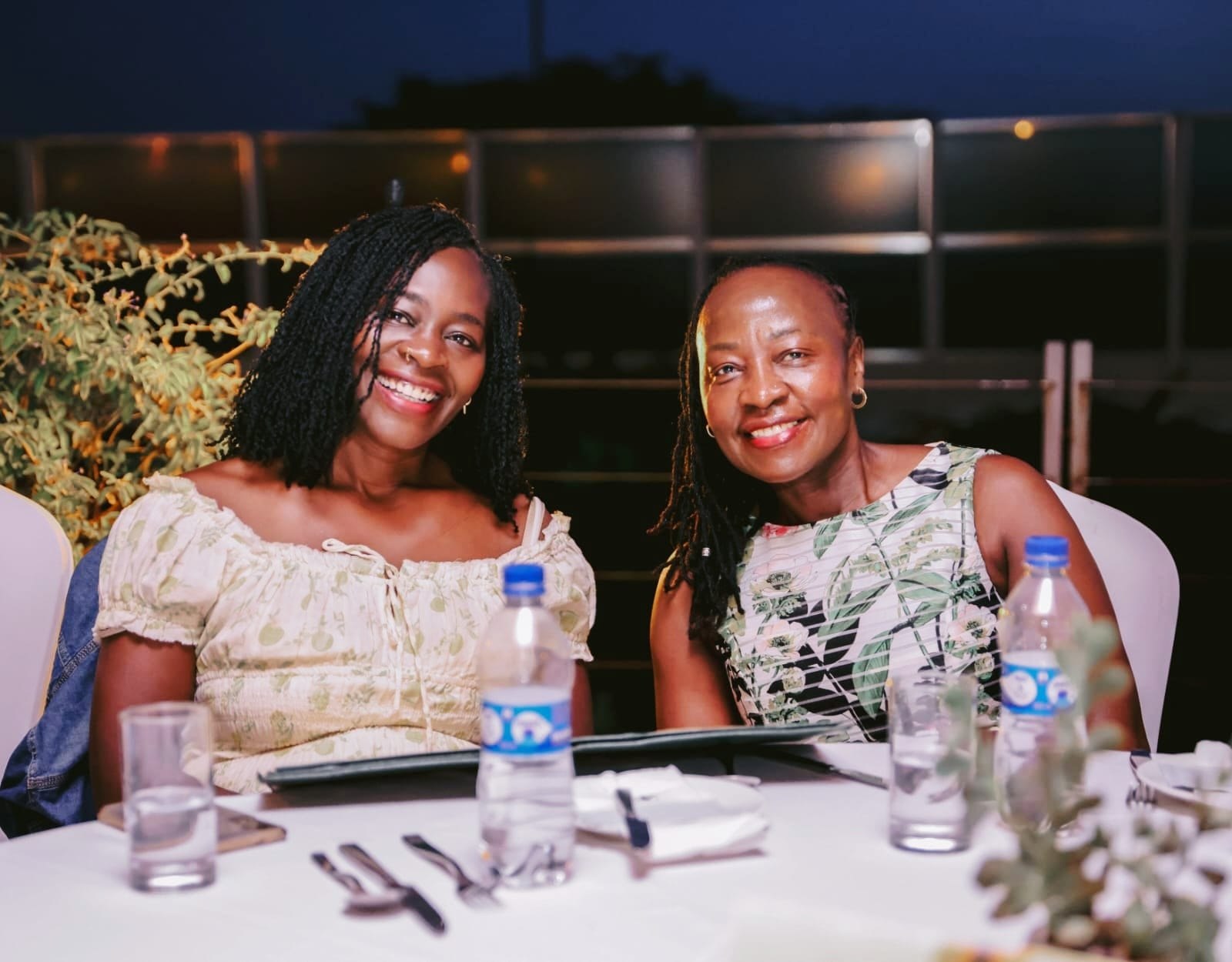 Sharing a meal and stories with friends around a warm table